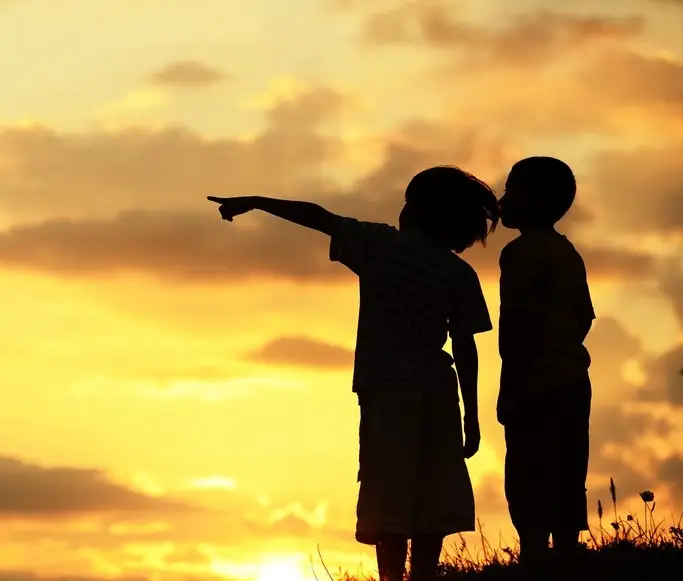 Photo of children enthusiastically pointing towards something in the distance, symbolizing our vision at TITAN University. This image represents our commitment to guiding learners towards a brighter future, emphasizing curiosity, exploration, and the pursuit of knowledge as we offer online education